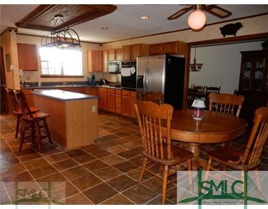 Kitchen. Large kitchen with island, slate floors a
