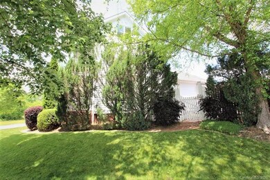 Landscaping on the front side of the home provides