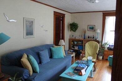 Unit 1: 1st floor living room.
