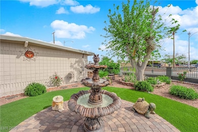 View of patio featuring fence