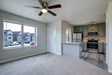 985sf 2 bed - Living Room carpeted