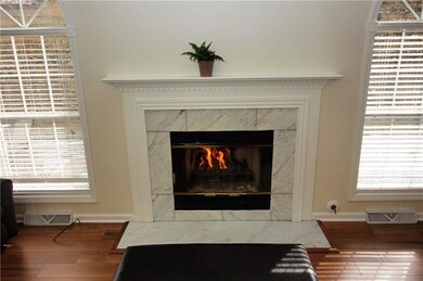Marble gas-log fireplace
