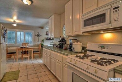 Large Kitchen with dining area close by.
