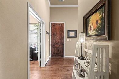 Flexible third bedroom or formal dining room near entrance.