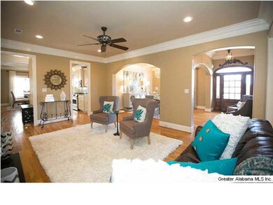 Another view of living room/ dining room/ foyer.