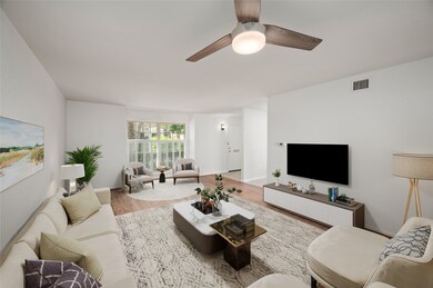 This picture was virtually staged. An inviting living room with ample space to entertain your family and guests.