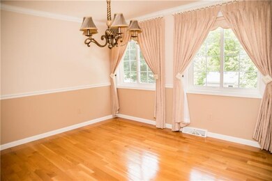 Elegant dining room has plenty of space to host ho