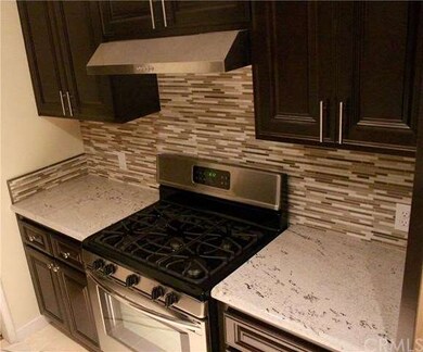 New range, granite counter tops and custom backspl