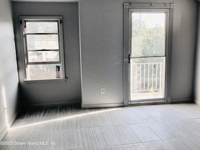 LIVING ROOM WITH TERRANCE - 115 JEANETTE