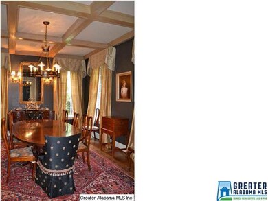 Second view of dining room showing cypress coffere