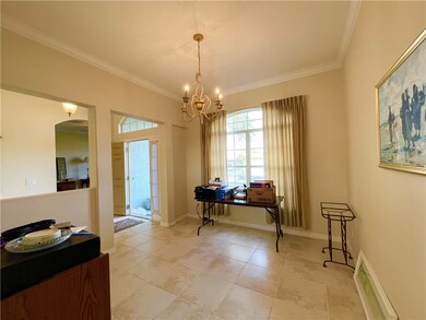 Formal Dining room taken from kitchen toward front