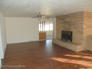 Living Room looking toward Sun Room/Den