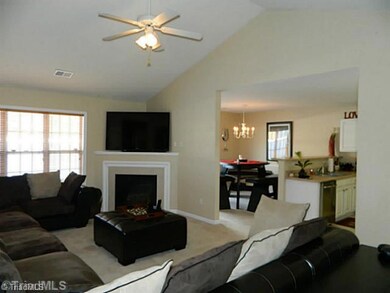 Living Room. LR has vaulted ceilings and fireplace