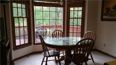 Breakfast room with amazing view of back yard. AWE