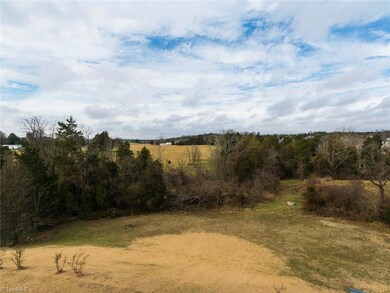 View from the 3rd floor bonus room of the backyard. .6 acre lot!