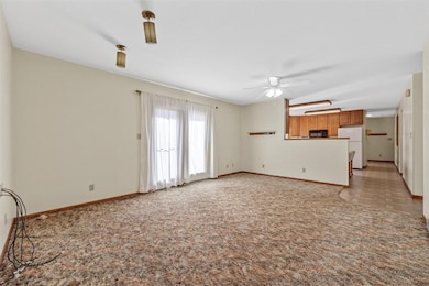 Living room looking toward kitchen.