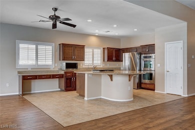 Great Kitchen features lots of cabinets, granite c