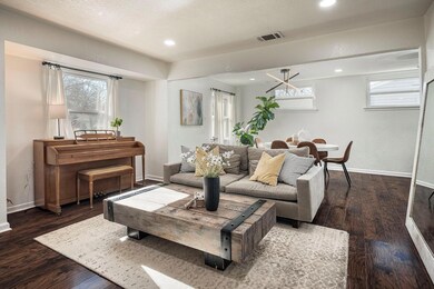 The living room is open to the dining room.
