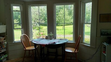 Breakfast area . These bay windows,...