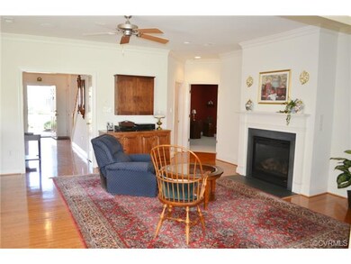 Family Room with gas log fireplace, crown moulding
