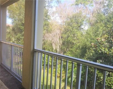 Second floor balcony has a screen.