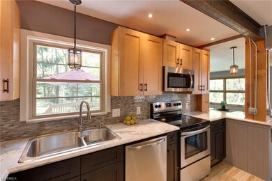 Custom tops and a deluxe stainless steel sink with