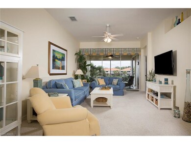 Open living area with view of the lake and fountain