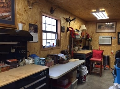 WORK SHOP IN BACK OF THE GARAGE