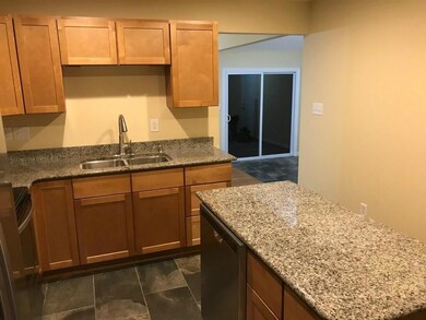 A brand new kitchen with granite...