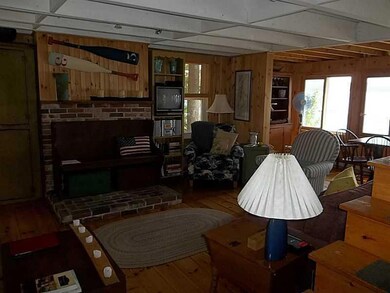 Living Room. LR w/woodstove outlet...