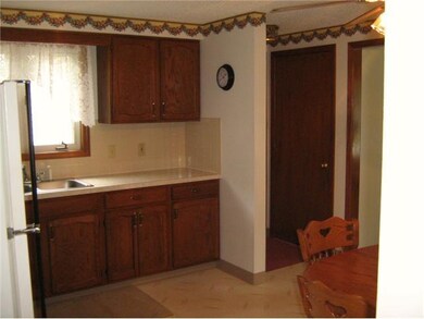 Kitchen View of basement door, garage door to the 