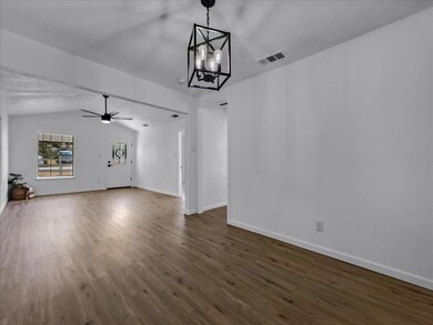 Unfurnished living room with lofted ceiling, ceili