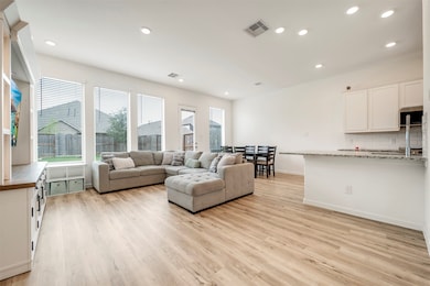 Wow, soaring ceilings and a wall of huge windows