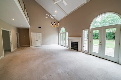 Matching french doors with palladian windows