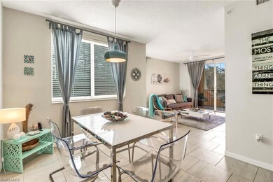 Tiled dining space with ceiling fan