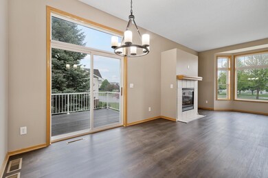 open concept dining with door to deck