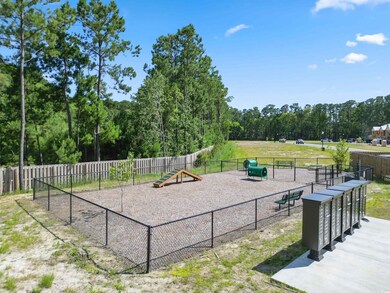 View of community with a dog friendly area