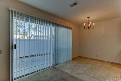 Large slider overlooks spacious patio area.