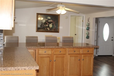 Beautiful solid wood cabinets under bar