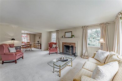 LIVING ROOM: The beautiful fireplace creates the a