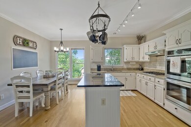 Large kitchen with center island. Beautiful views