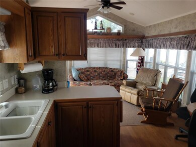 kitchen/dining/living room with pull out sofa for 