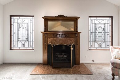 CUSTOM FIREPLACE WITH GORGEOUS MIRROR GLASS MANTLE