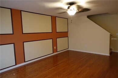Living Room with staircase to second floor.