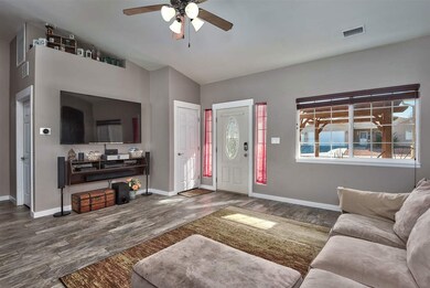 There are display alcoves throughout the living ro
