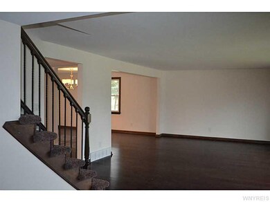 Living Room. View from the Foyer, with one step up