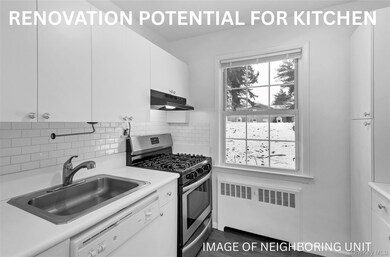 Kitchen with radiator heating unit, gas range, under cabinet range hood, white dishwasher, and light countertops