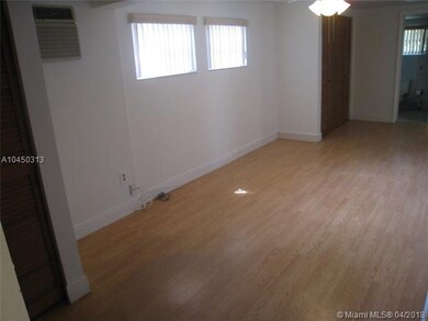 Bedroom on one side of the house with its own bath