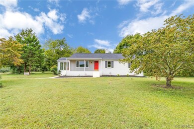 This gorgeously renovated home sits on a 12-acre l