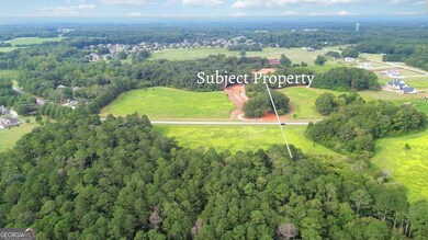 LOT 1 Sikes Rd, Statham, GA 30666 - photo 4